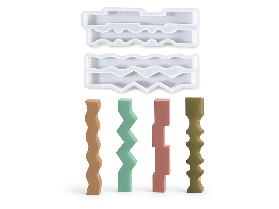Custom silicone pillar-candle molds with finished candles from RUUIPON